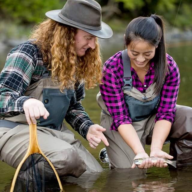 Netting small fish in a stream in the Catskills, New York